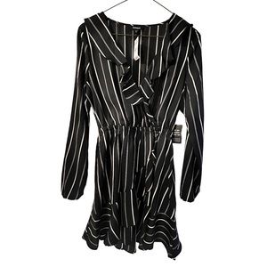 Black dress w/ white/gray vertical lines design. Never worn, in great condition.